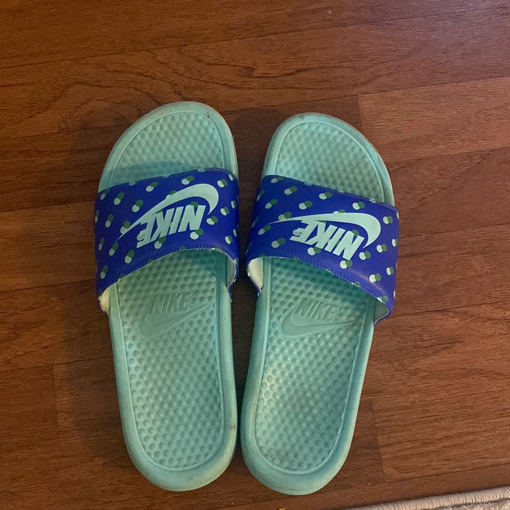 Blue/green Nike slides